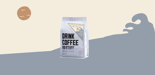 Coffee bag with 'Drink Coffee Do Stuff' text on a gradient background